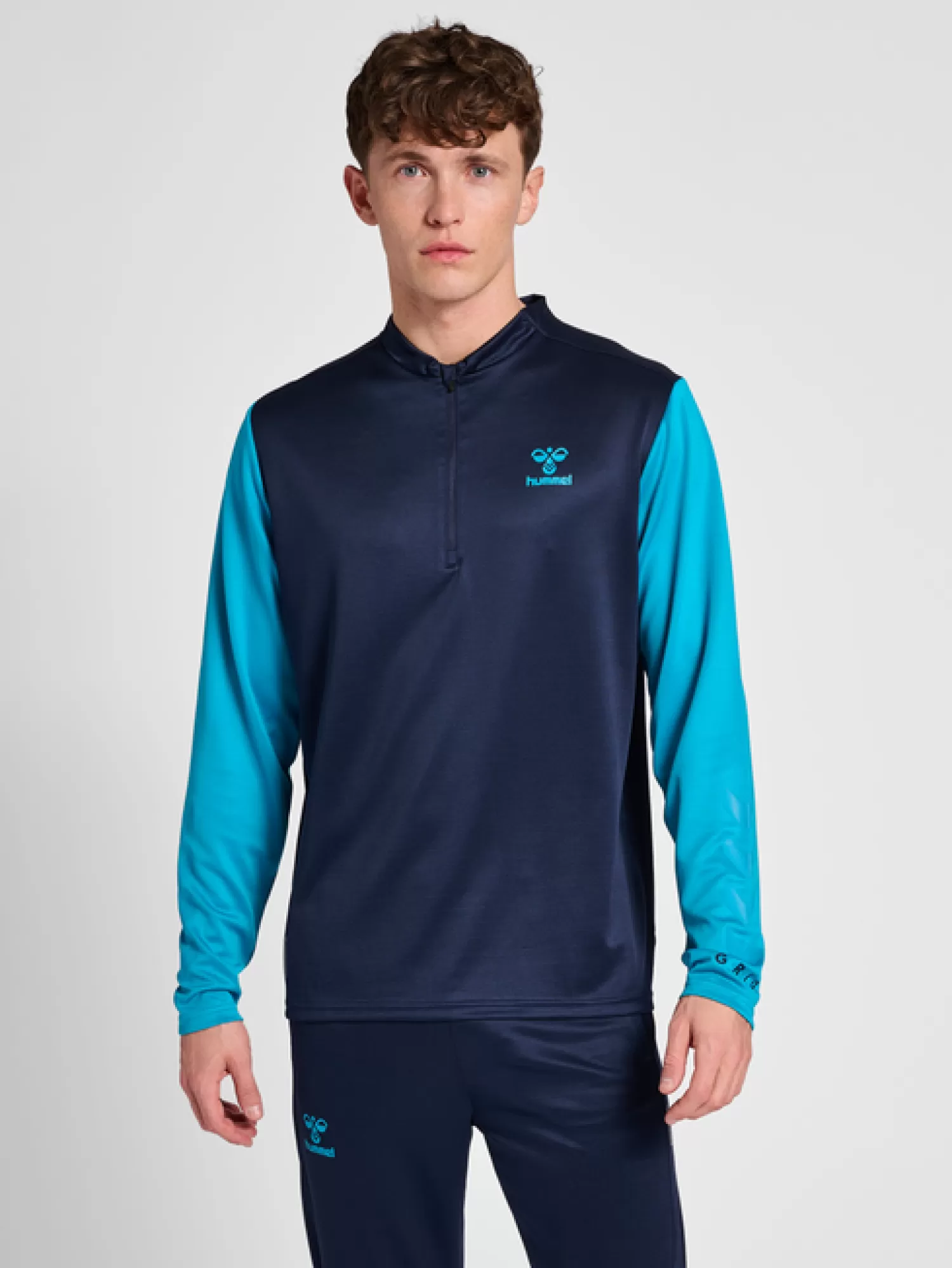 Hummel Running | Training<hmlONGRID 1/2 ZIP POLY SWEAT